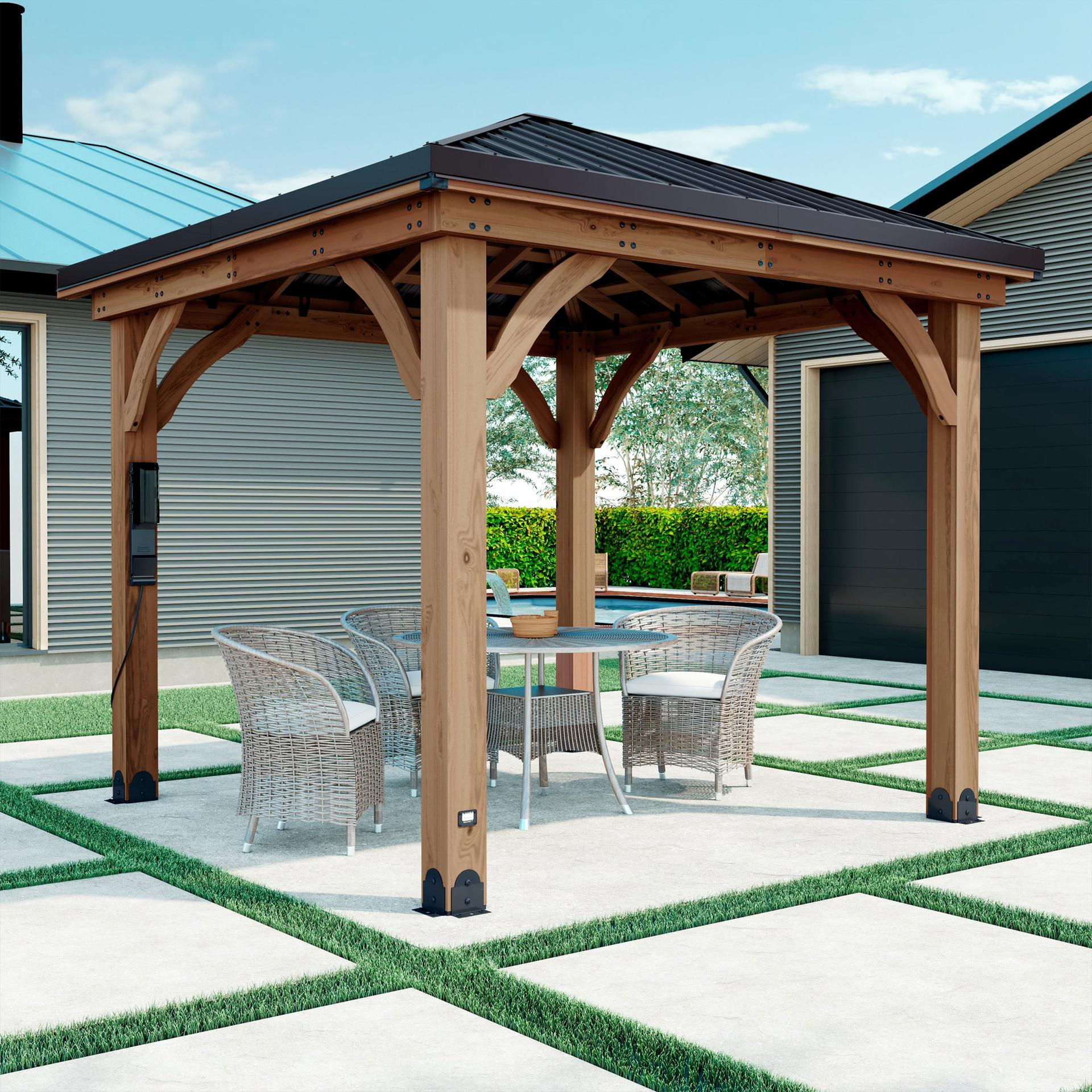 Backyard Discovery Barrington cedar gazebo with a dark galvanized steel hip roof over a patio dining set