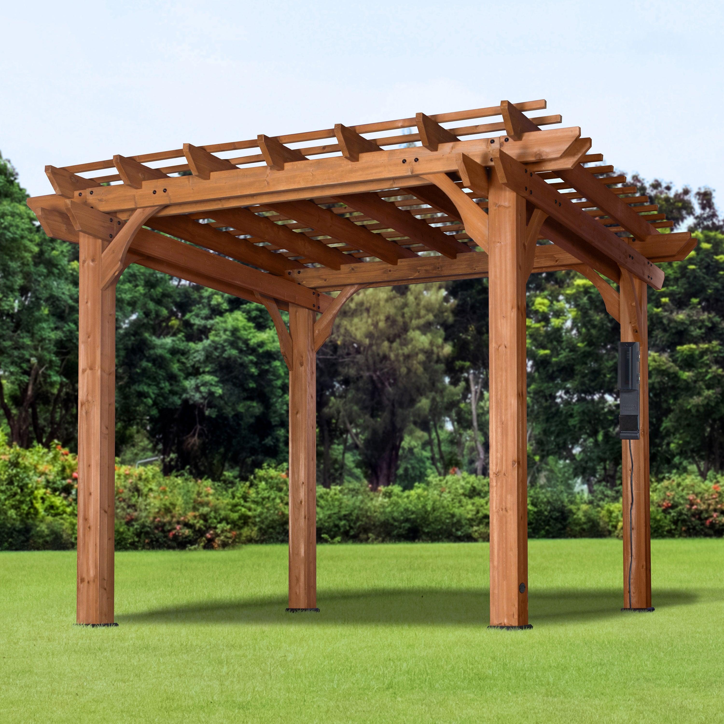 Beaumont cedar pergola standing on a lawn, showing the four posts, corbels and open trellis roof