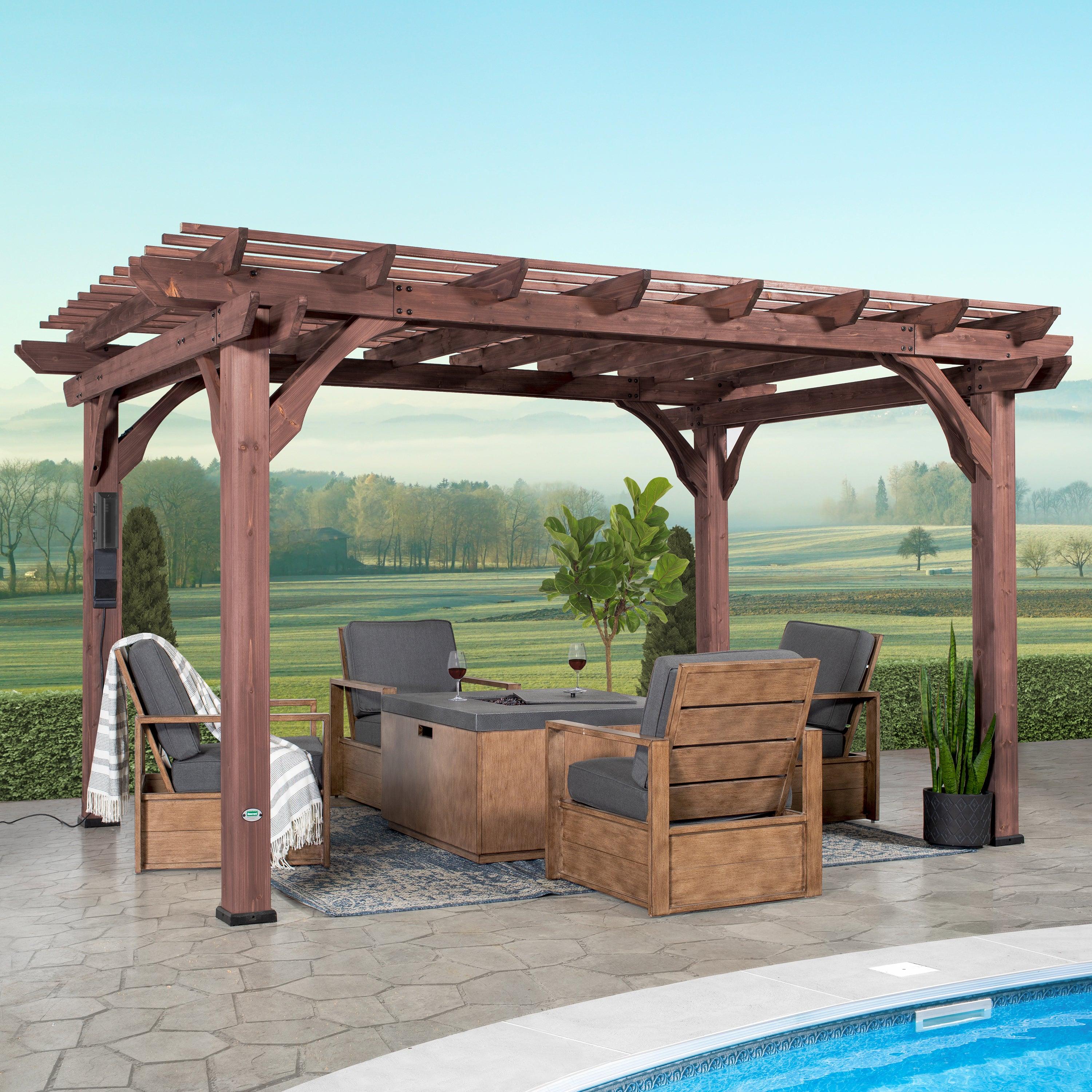 Backyard Discovery Somerville cedar pergola in walnut stain over a poolside fire table and chairs