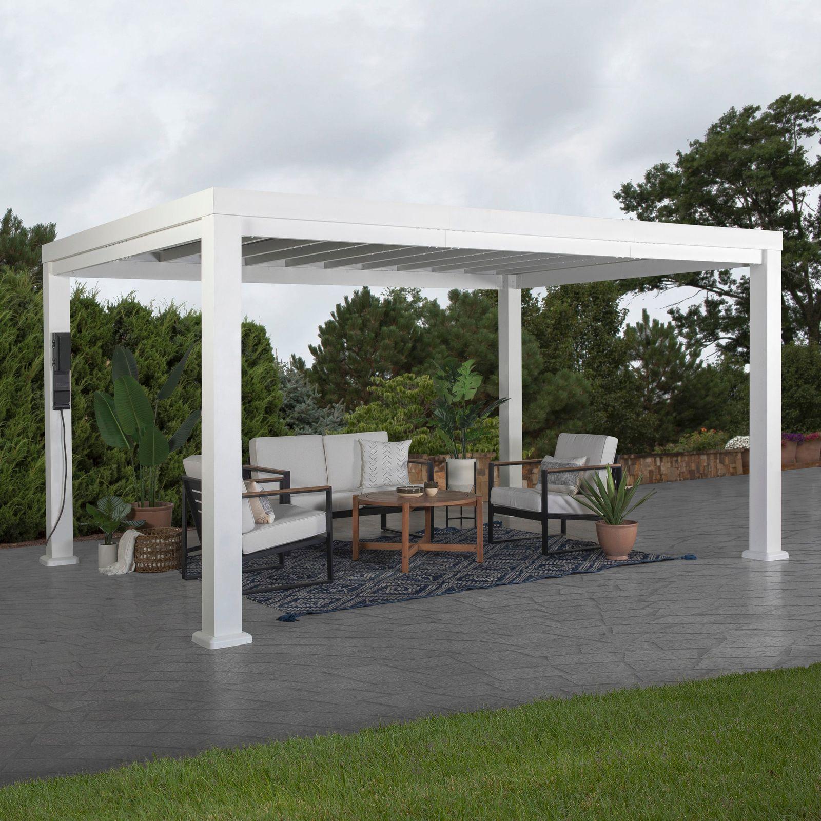 Backyard Discovery Windham modern steel pergola in white with its sail shade canopy over a patio sofa set