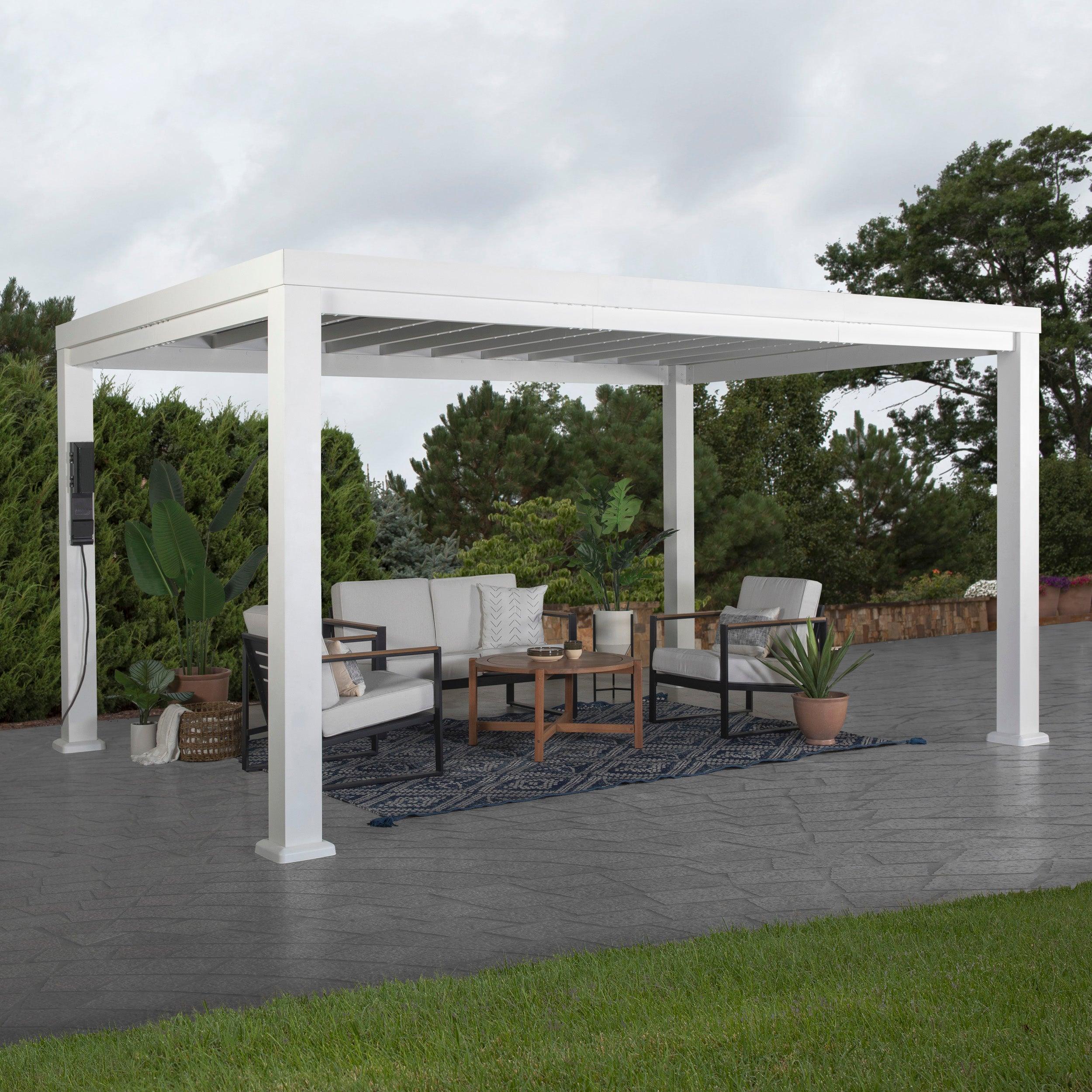 Backyard Discovery Windham modern steel pergola in white with its sail shade canopy over a patio sofa set