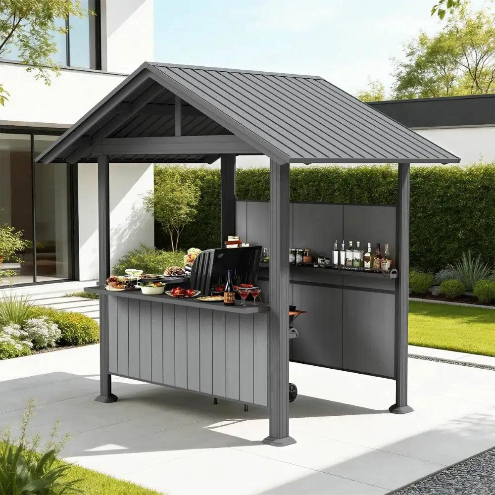 Domi Outdoor Living 9x6 hardtop grill gazebo with a gable roof and a bar counter on a patio beside a modern house