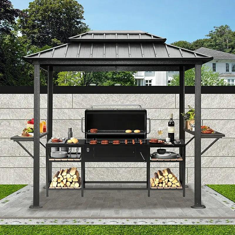Domi Outdoor Living 6x8 hardtop grilling gazebo with a two-tier dark roof over a charcoal grill, side shelves and stacked firewood
