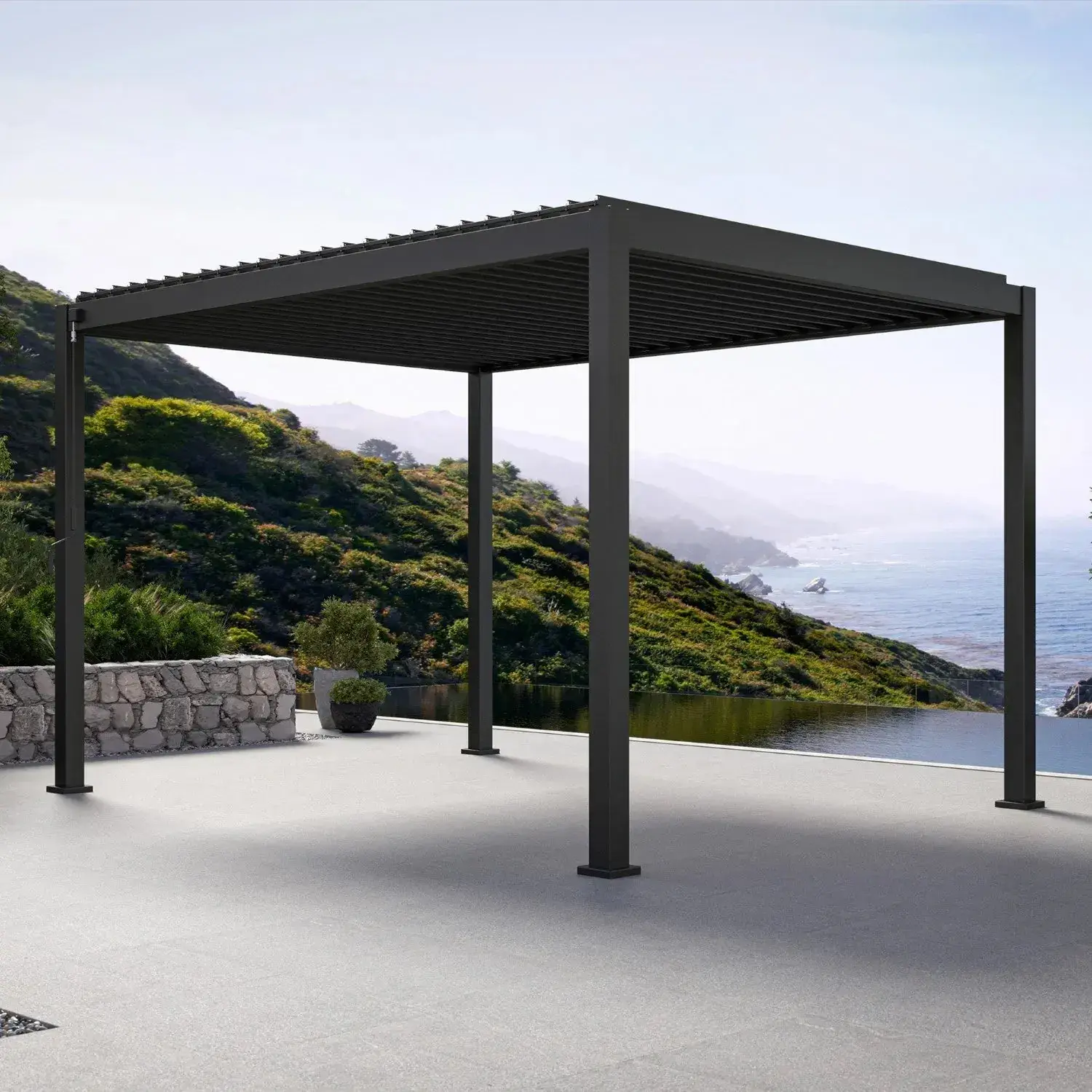 Mirador 111DA double-layer aluminum louvered pergola in charcoal on a coastal terrace, louvers visible edge-on