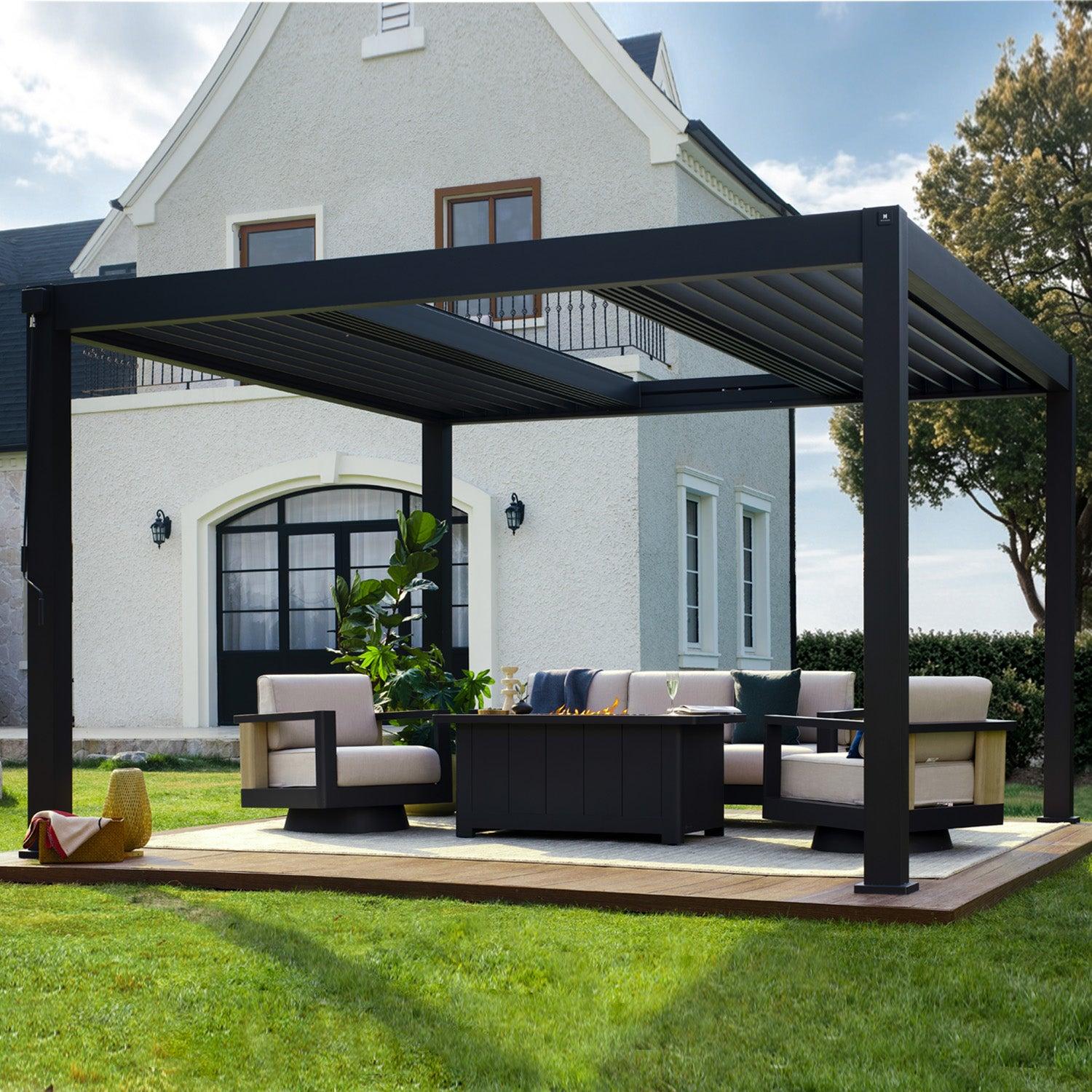 Mirador 140DA Sky louvered pergola in charcoal on a lawn deck beside a white house