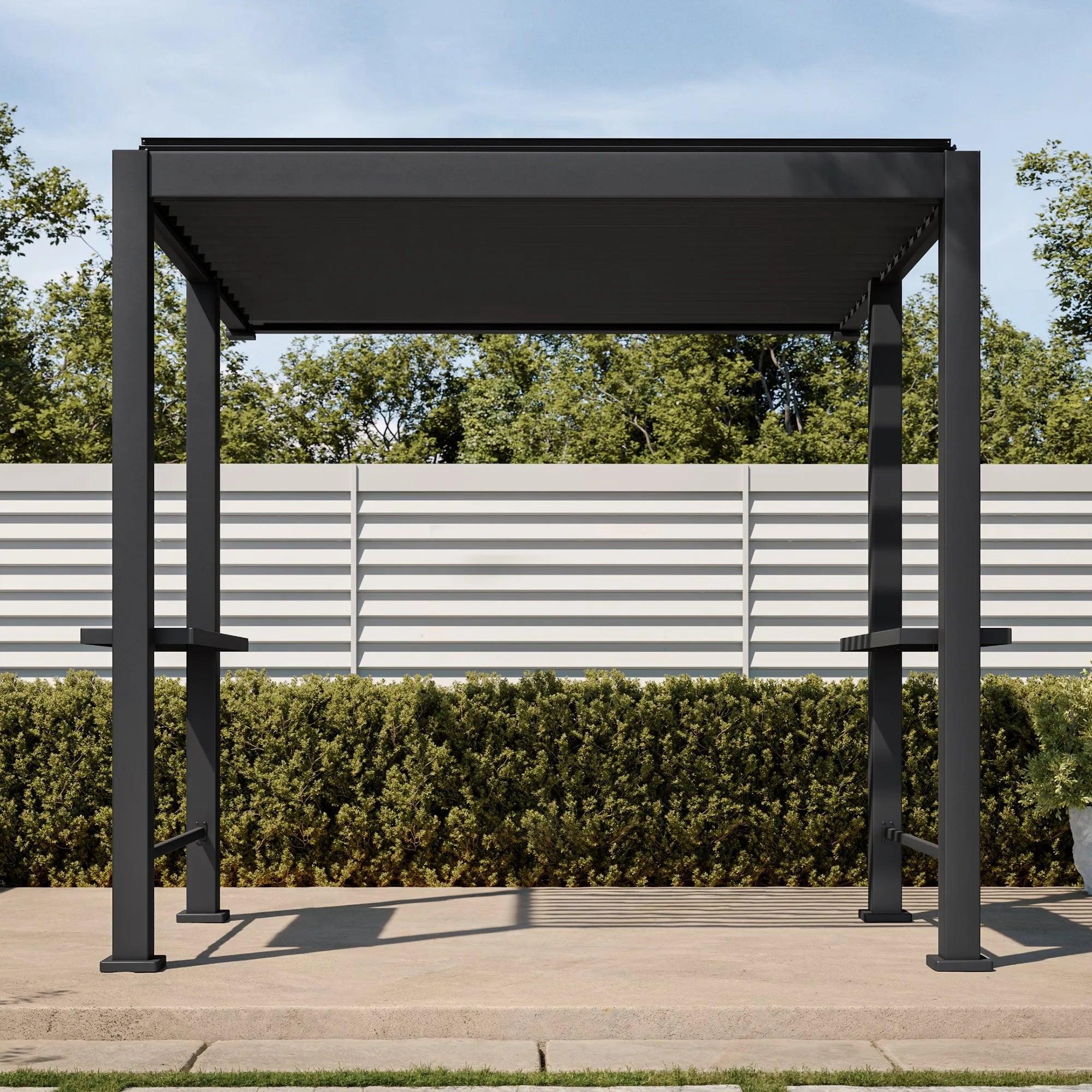 Mirador Grill XL pergola in charcoal seen head-on, showing the bar shelves and the integrated awning extended