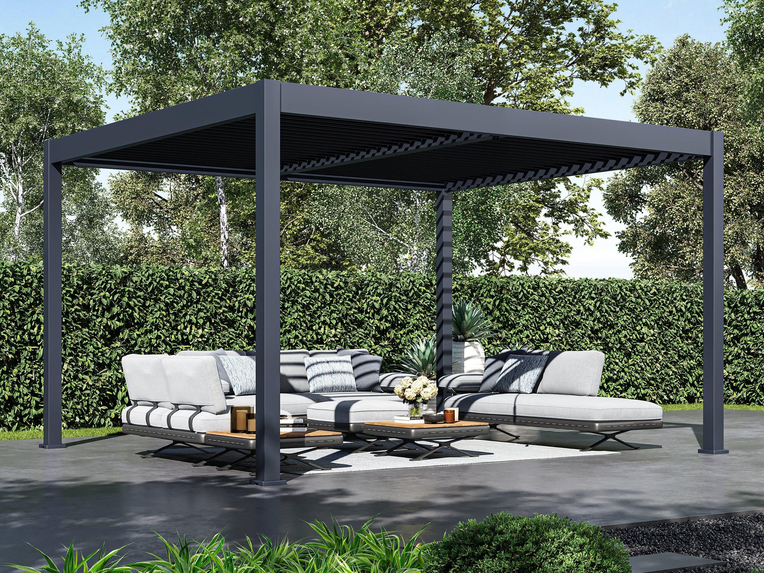 Paragon Outdoor Grand Tuscan louvered pergola in Slate Gray over a patio sofa set, louvers partly open