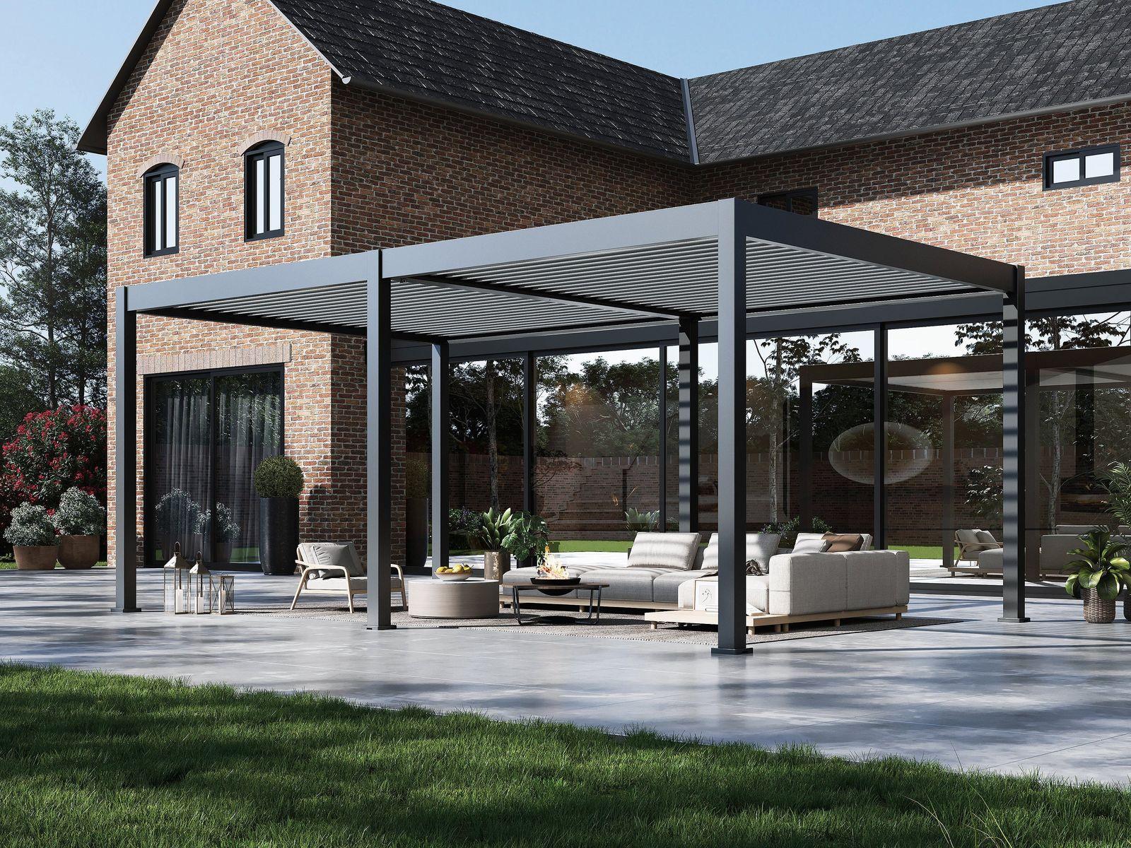 Paragon Lugano louvered pergola with Slate Gray frame and Light Gray louvers over a sofa set on a terrace