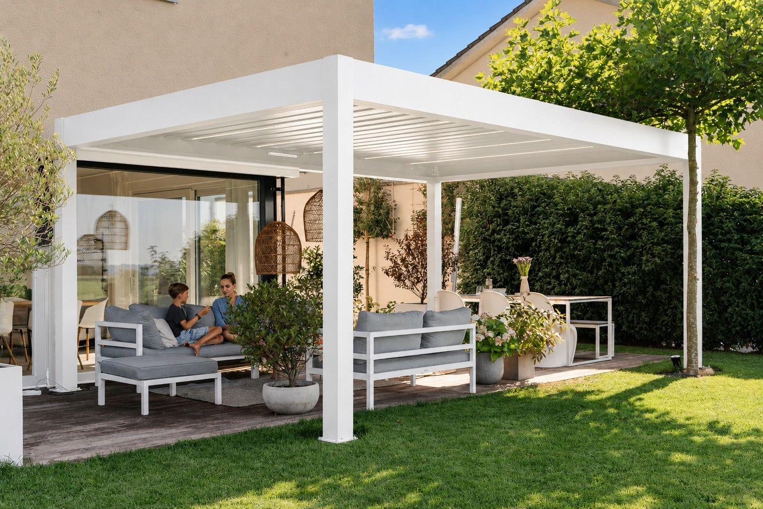 PERGOLUX Pergola 4 Pro Max motorized louvered pergola in white over a garden terrace lounge with a family seated beneath