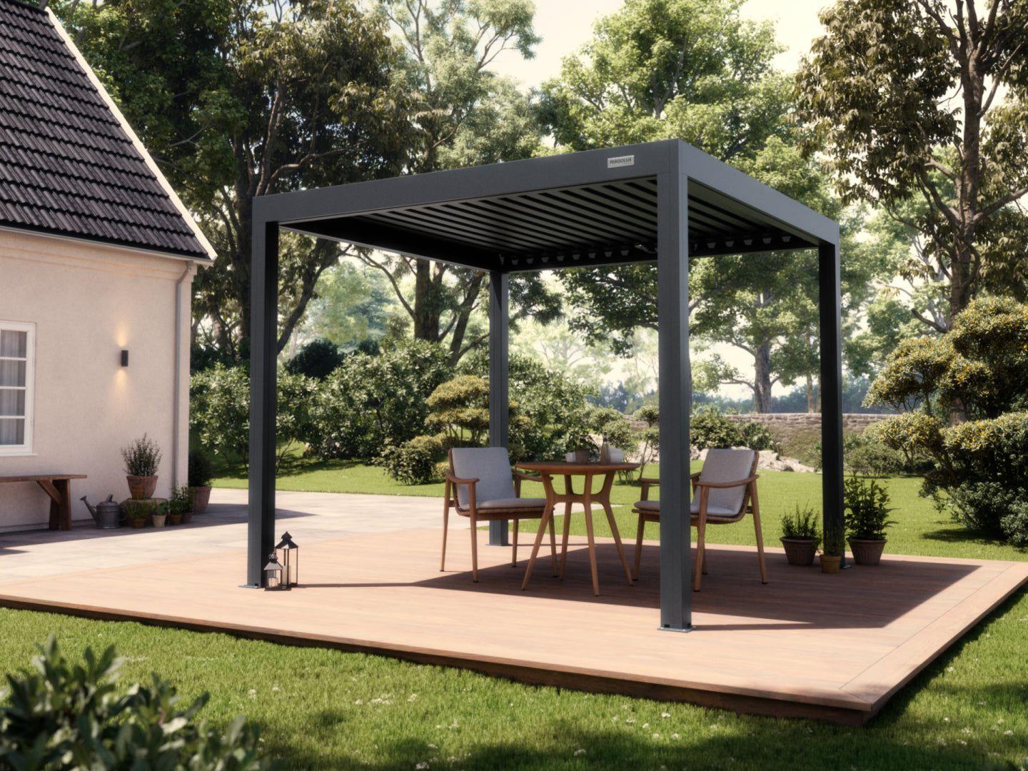PERGOLUX Standard S3 louvered pergola in anthracite, freestanding over a timber deck with a dining set beside a white house