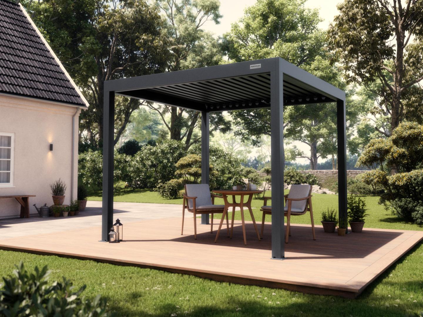 PERGOLUX Standard S3 louvered pergola in anthracite, freestanding over a timber deck with a dining set beside a white house