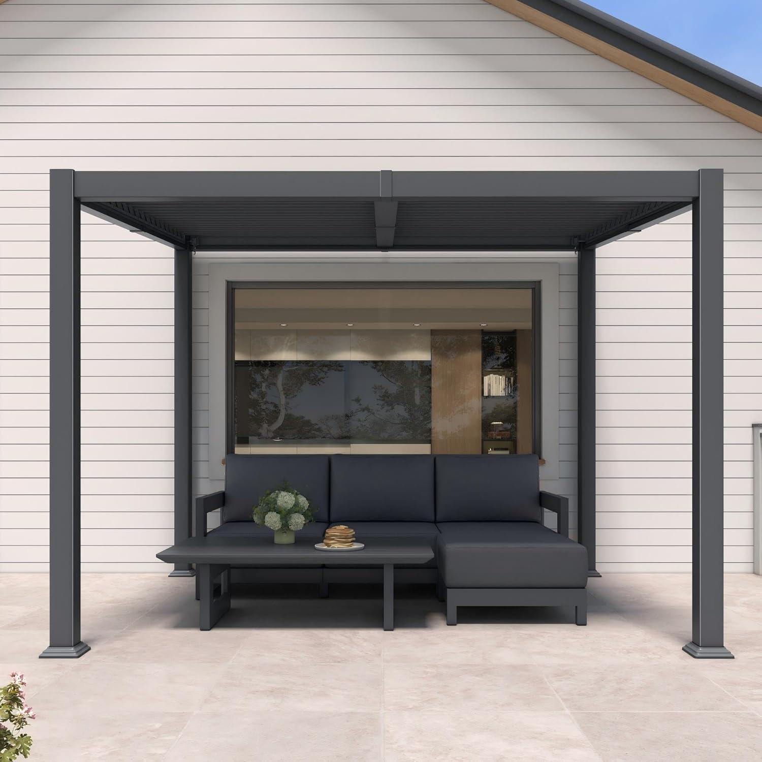 Grey PURPLE LEAF Caesar slanted-roof pergola seen head-on over a corner sofa on a pale stone terrace