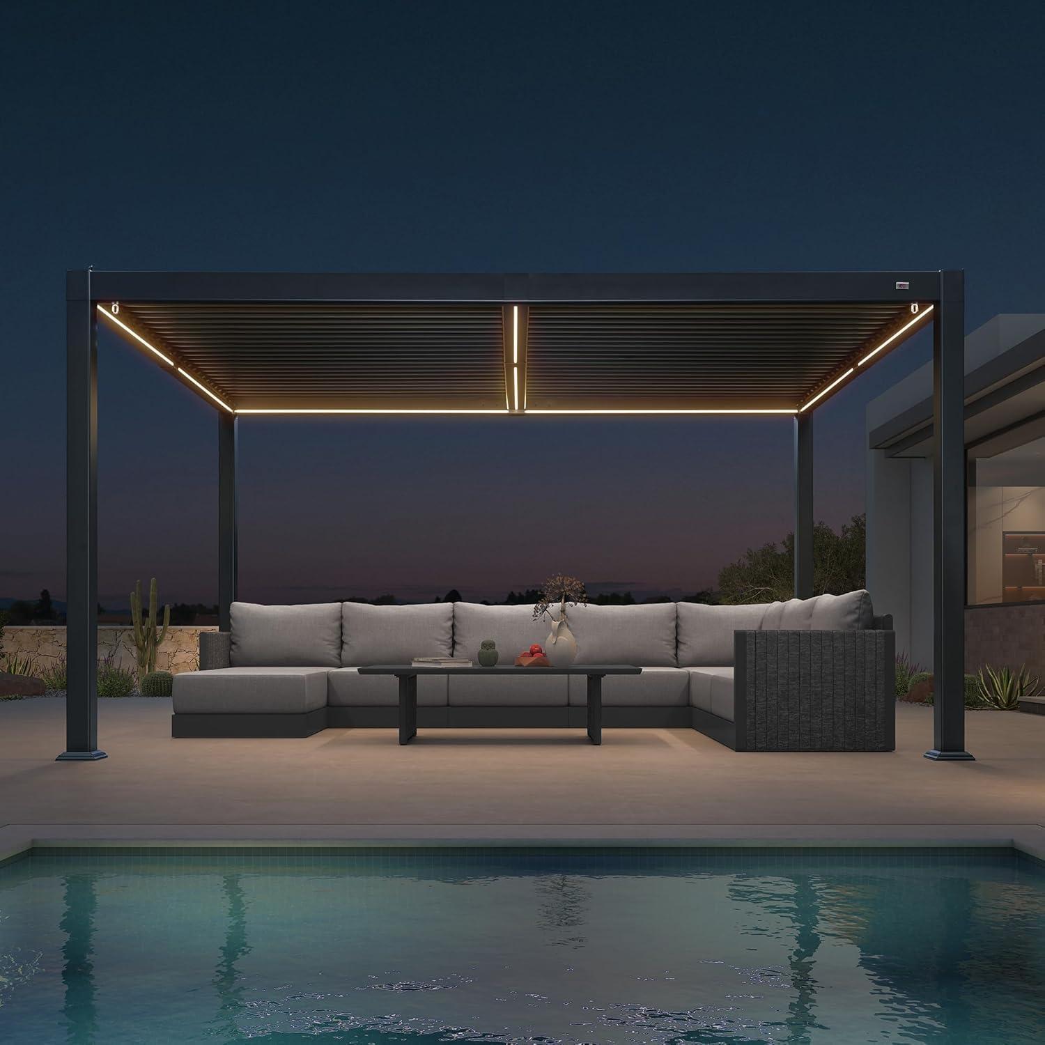 Grey PURPLE LEAF Caesar Solar LED pergola lighting a large corner sofa on a desert pool terrace at night