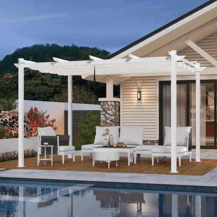 PURPLE LEAF retractable double-canopy pergola with a white aluminium frame and white canopy over a poolside deck at dusk