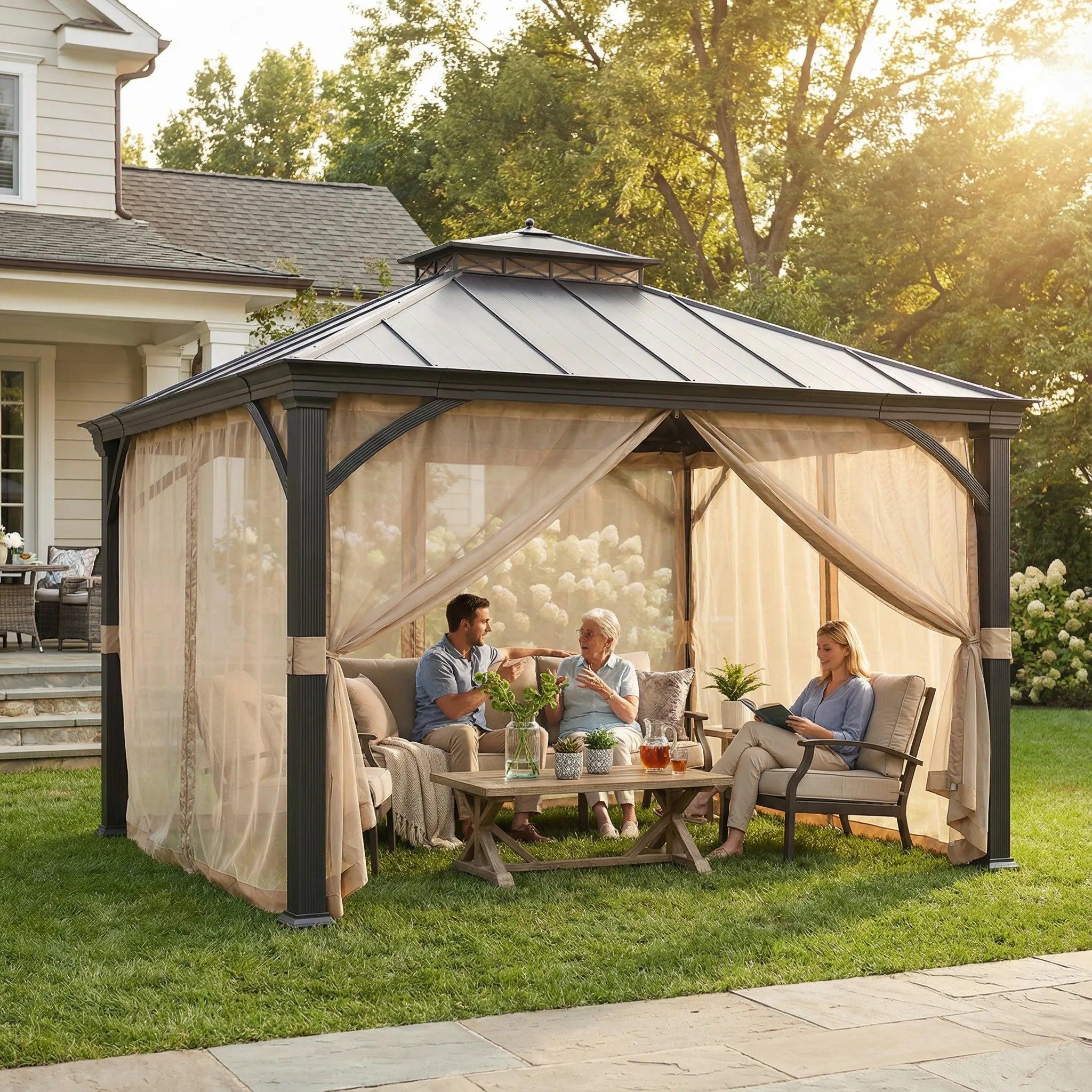 Sunjoy 11x13 aluminum-frame metal gazebo on a lawn with three people seated around a table beneath the netting