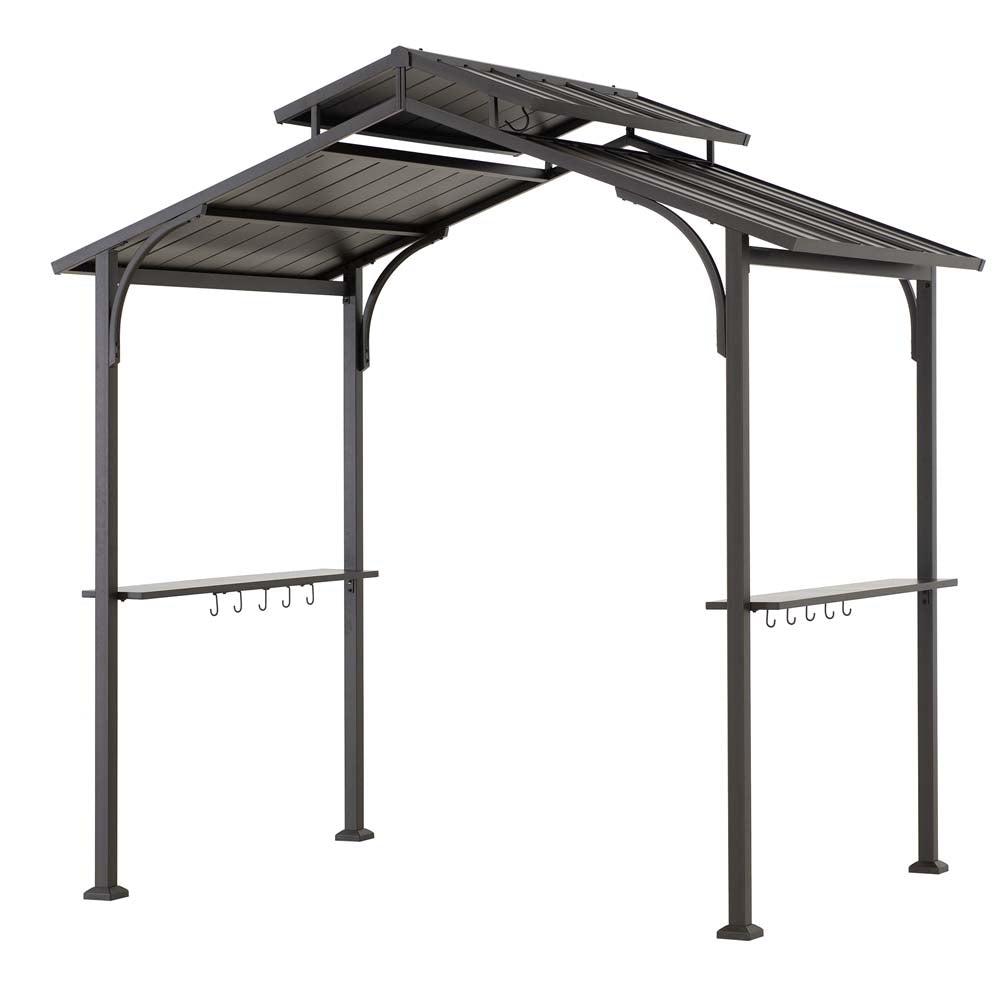 Sunjoy Classic Urban 5x8 grill station, studio view of the double-tier steel roof on a brown frame with bar shelves and utensil hooks on both sides