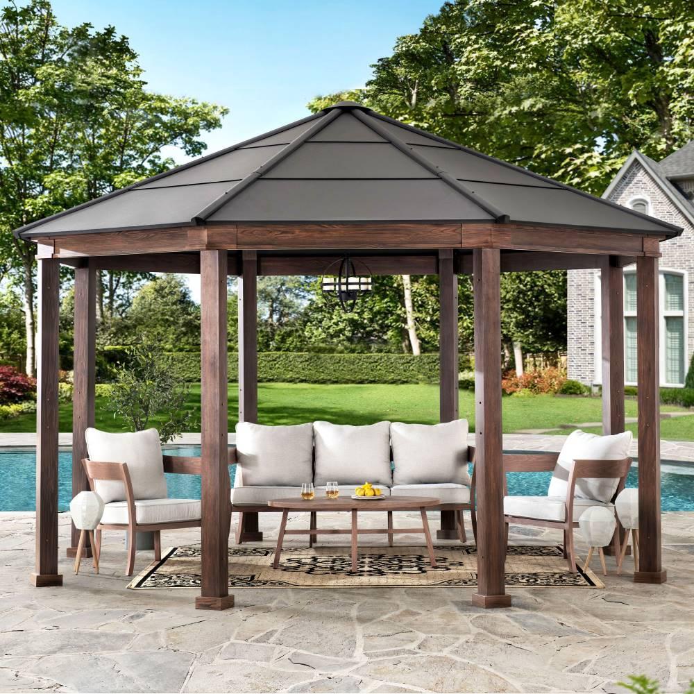 Daybreak octagon gazebo beside a pool with a sofa and armchairs beneath