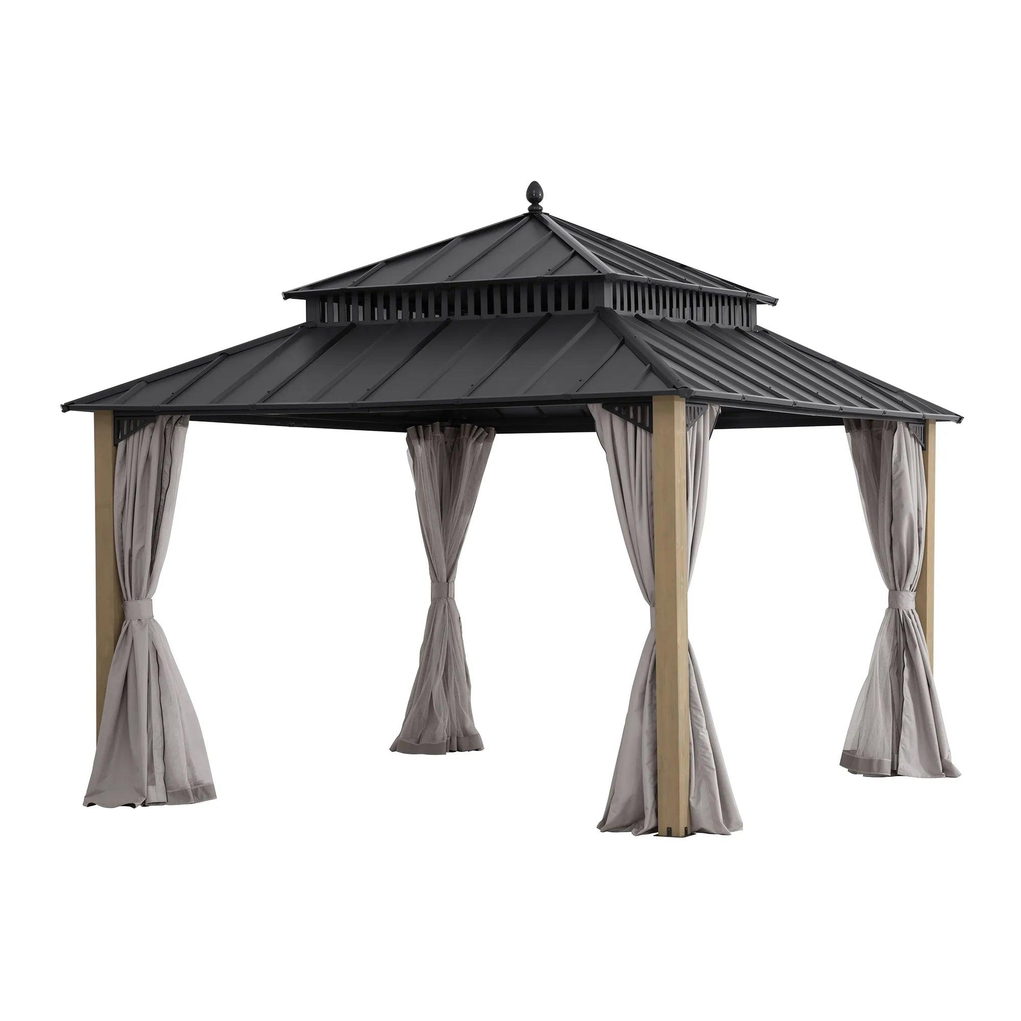 Sunjoy Kingston Elite Cedar gazebo 12x12, studio view of pale timber posts under an all-steel two-tier roof with curtains tied back