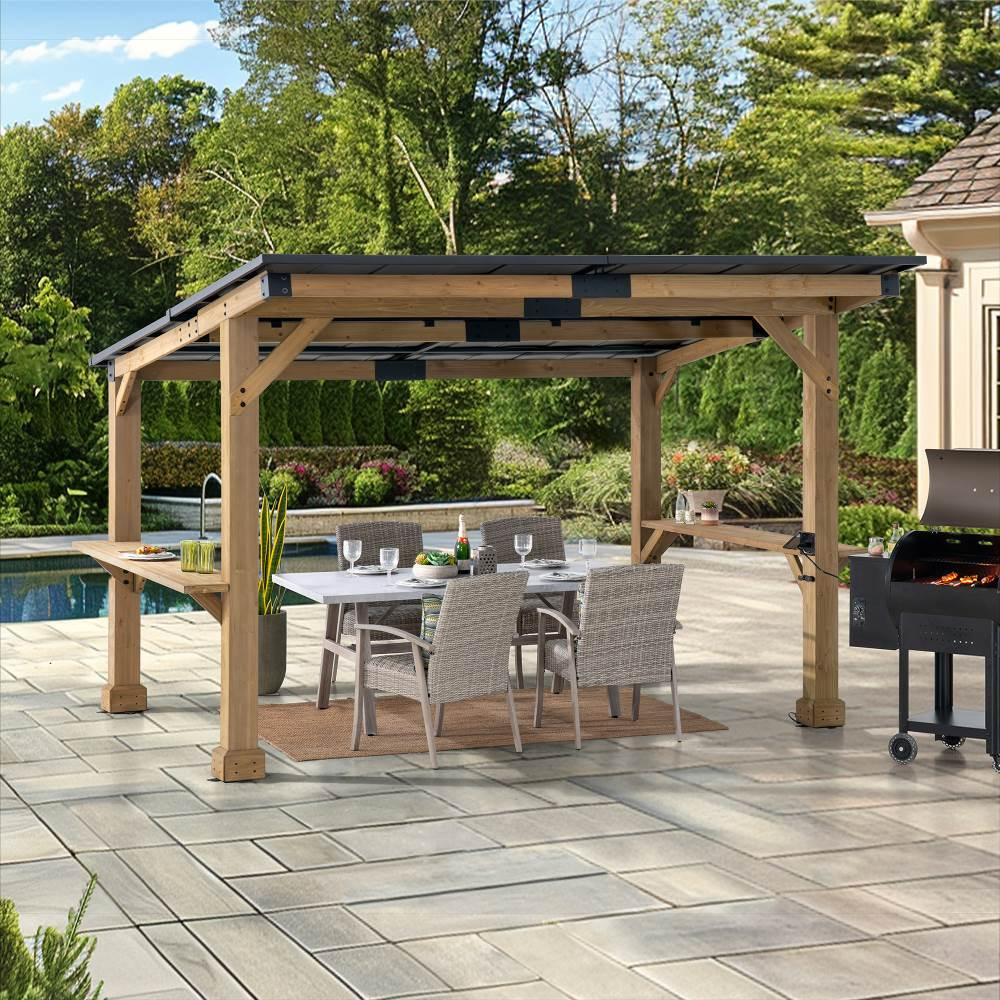 Sunjoy Meridian Bar Shelves structure on a paver patio beside a pool, a dining set beneath the steel roof and a pellet grill alongside