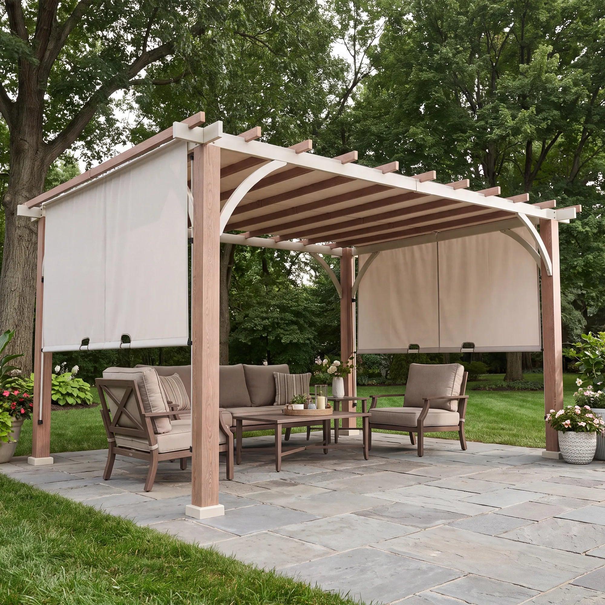 Sunjoy Palladio 12x14 wood-grain pergola on a flagstone patio shading a cushioned lounge set, side canopy panels lowered