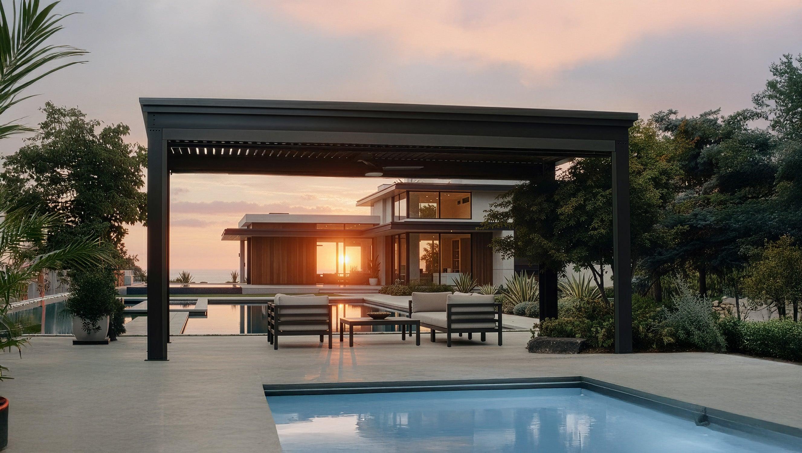The Luxury Pergola four-post louvered aluminum pergola in black, over a poolside seating area at sunset