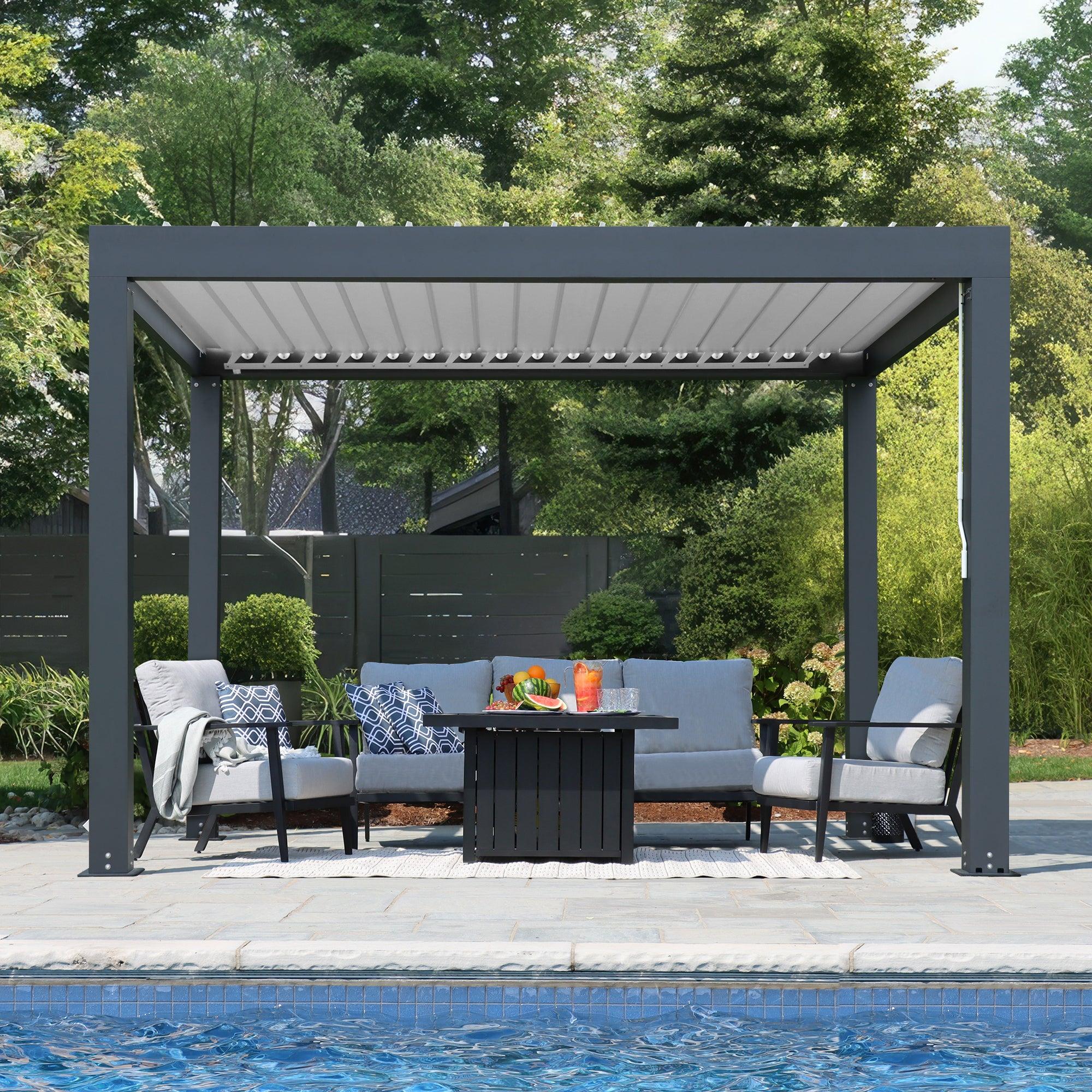 The same Yardistry Aluminum Louver Room in graphite grey with its louvers closed, casting full shade over the poolside seating area