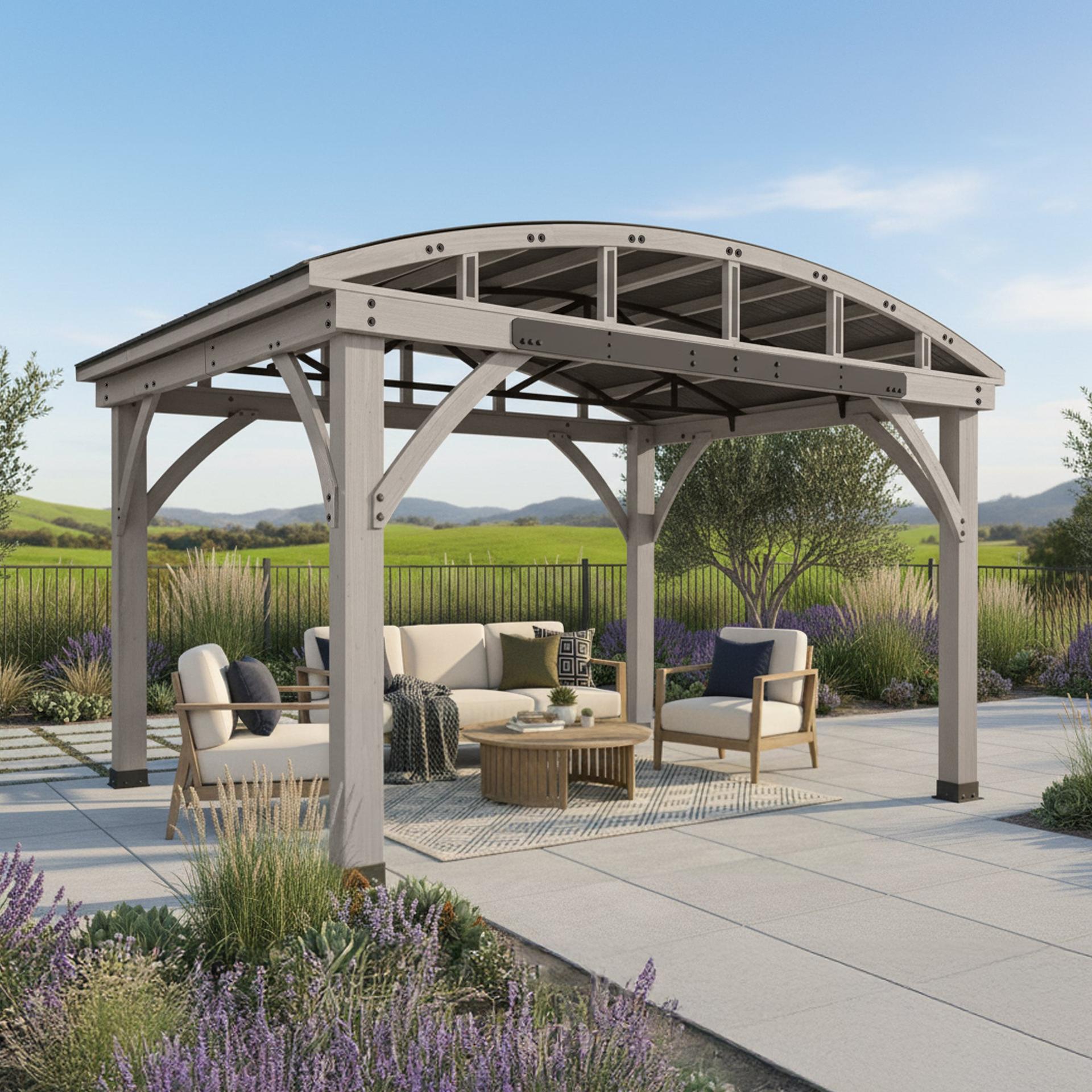 Yardistry Arched Roof Gazebo with a curved aluminum roof and grey-stained timber frame over a patio seating set