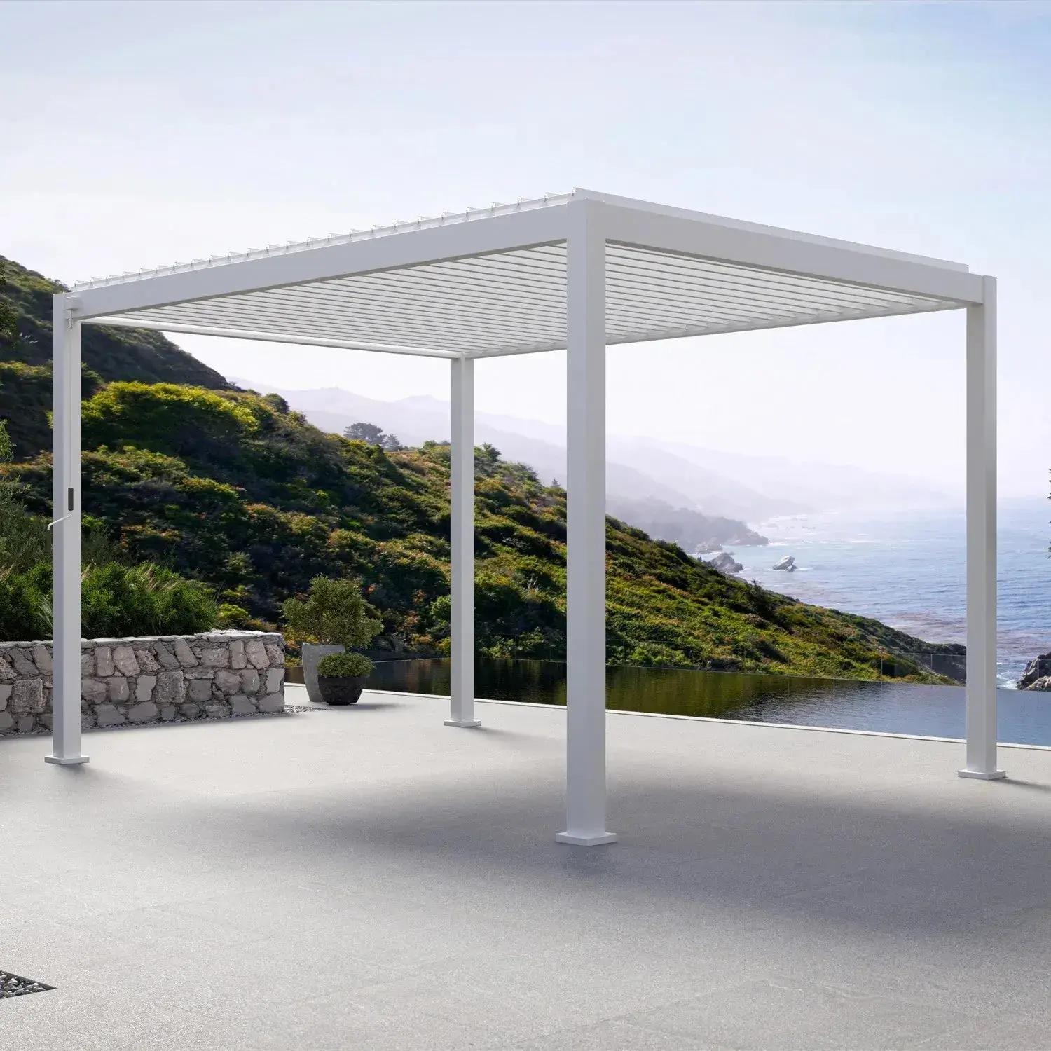 Mirador 111DA louvered pergola in white on a clifftop terrace overlooking the sea